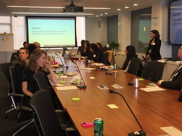 Meeting in progress around conference table