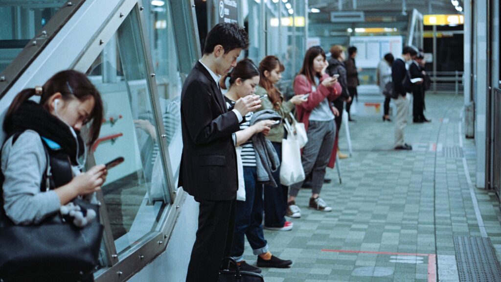 Commuters on station platform in asia