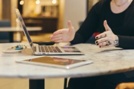 Woman's hands over laptop